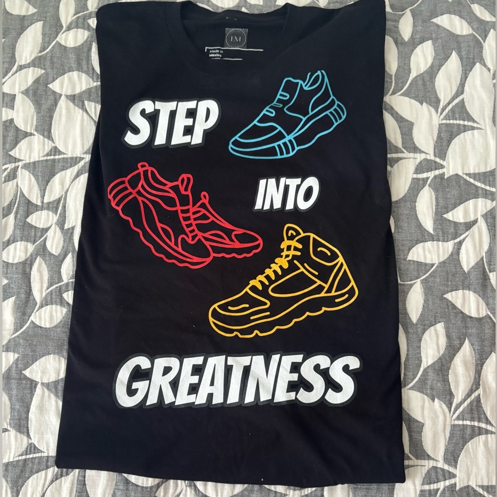 Black Graphic Tee with Colorful Shoe Designs